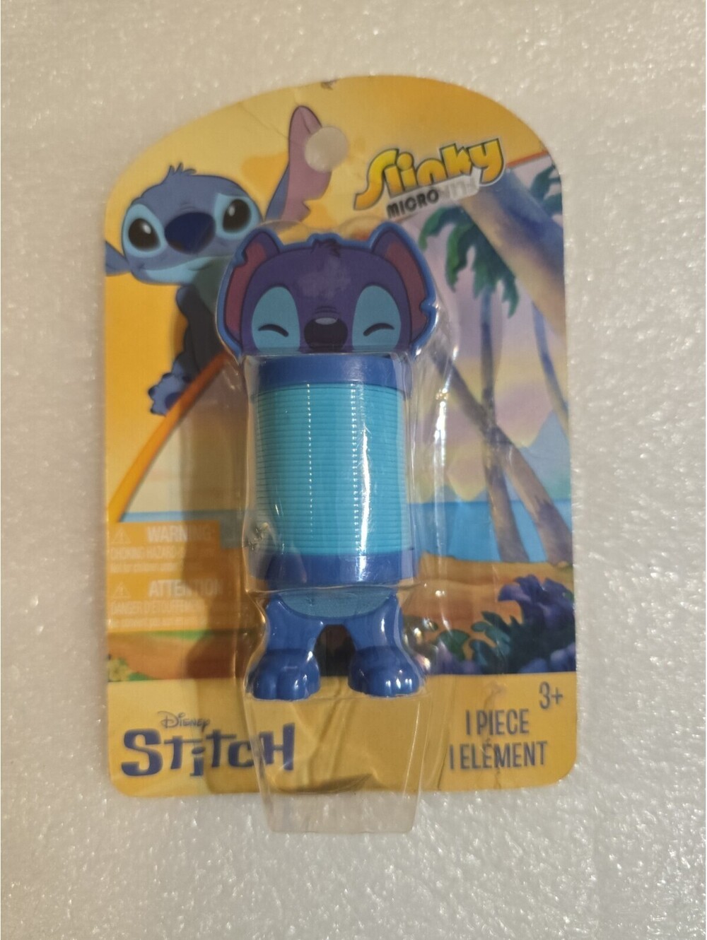 Dinsey Stitch Slinky Micro Flip Tara Toys NIP